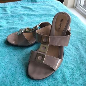 Beige shiny wedge sandals with gold accents